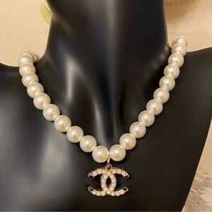 Chanel Pearl Necklace with Gold-Tone Interlocking CC Charm